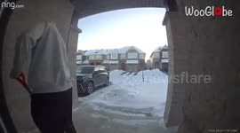 Man slips in the porch stairs trying to clear the snow away *Hilarious Fail*