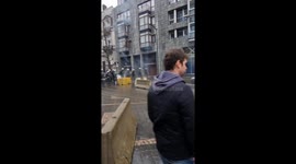 Protesting farmers driving tractors met with police roadblock in Brussels