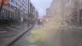 Protesting farmers driving tractors met with police roadblock in Brussels