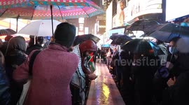 Activists gathered on Times Square in front of U. S. Army Recruiting Office in New York for vigil of airman Aaron Bushnell who died of self immolation at theIsraeli embassy in Washington, DC. Heavy rain did not stop more than hundred activists from stagin