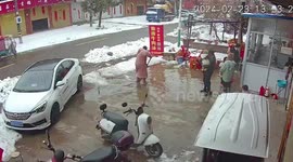 Family runs for cover when snow falls from roof
