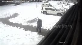Resident knocked over by snow falling from solar panel on roof