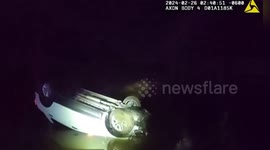 Officers brave waters to rescue trapped driver from bridge plunge in Texas
