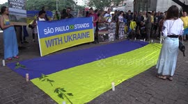 Ukrainian protesters demonstrate and walk along Avenida Paulista in São Paulo