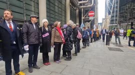 Extinction Rebellion activists surround Lloyd's building in London