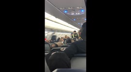 Passengers applaud as disruptive passenger is removed from flight