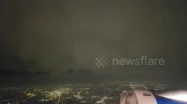 Passenger captures terrifying lightning show from plane window as storm sweeps over Chicago