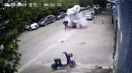 Man flees as firecrackers explode on electric scooter in southern China