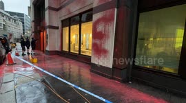 Climate activists douse insurance company HQ with red paint in London