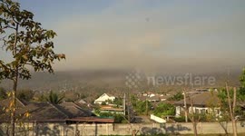 Smoke engulfs forest as wildfire rages on mountain in northern Thailand