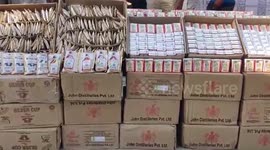 Head of village arrested by police for possessing illegal liquor in southern India