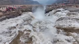 Yellow River's largest waterfall thaws after icy winter in China