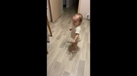 Dizzy Baby Bounces Off Cabinet