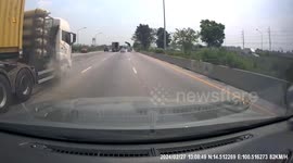 Lorry wheel bursts sending debris into oncoming car
