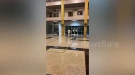 Model in high heels topples over while doing back-bending posing