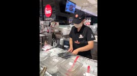 Ice cream toss cone awry: hilarious mishap in Taichung City