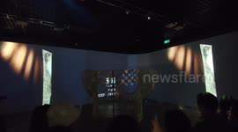 Visitors view the Sanxingdui Global Touring Exhibition at the Shanghai Museum in China