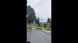 Content creator narrowly escapes collision in Ciwidey, Indonesia