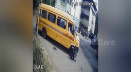 School bus driver hits two girls, flees the spot , Accident captured in CCTV camera