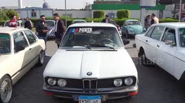 Vintage car enthusiasts join highway cruise in Cairo