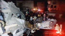 Fourteen people died in an Israeli air raid on a house in Gaza