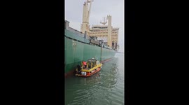Diver going under cargo ship - Most Dangerous job in the World