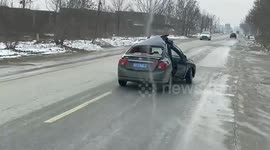Chinese man determinedly drives mangled car to repair shop following serious accident