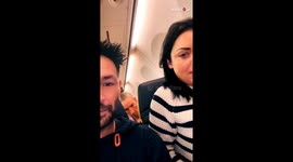 Woman creepily stares a couple making their video on a flight *Hilarious*