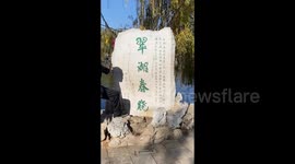 Tourists Visit Cuihu Park in Kunming, China