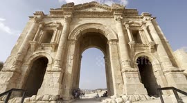 Going through the impressive entrance of the Jerash Ruins in Jordan. It is an ancient city located in Jordan that dates back to the Greco-Roman period. It is one of the best-preserved Roman cities in the world.