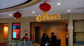 Tourists Eat at A Haidilao Chain Store in Yichang, China