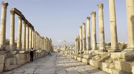 Walking among the amazing Roman columns on Jerash archeological site in Jordan. Jerash is an ancient city located in Jordan that dates back to the Greco-Roman period. It is one of the best-preserved Roman cities in the world.