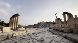 Walking among the Roman ruins on Jerash archeological site in Jordan. Jerash is an ancient city located in Jordan that dates back to the Greco-Roman period. It is one of the best-preserved Roman cities in the world.