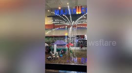 Band continue concert under tent despite flood