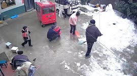 Man watching family shovel snow gets buried under massive avalanche from roof