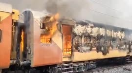 Fire rips through train at station in south India