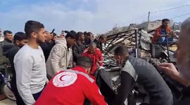 Medical workers recover bodies from bombed truck in Gaza's Deir al-Balah