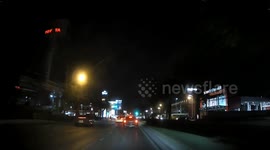 Shooting star streaks across night sky by in Thailand