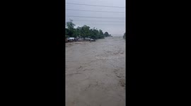 Dramatic moment floods wash away homes in the Philippines