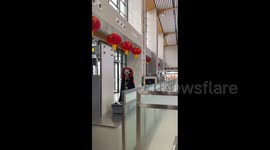 The bride goes to the security check in Xichang, China