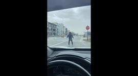 Man Has Fun With Tumbleweeds During Windstorm
