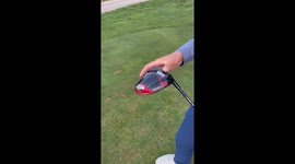 Golfer hits ball so hard it gets stuck inside his club