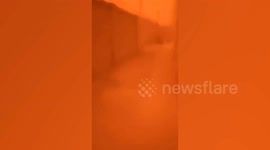 Strong sandstorms engulfs homes and covers it in orange hues in China