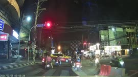 Tourist tries to jump road barrier on crossing but fails spectacularly