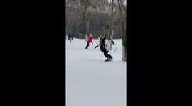 Graceful Skier Mesmerizes on Natural Snow Slopes of China