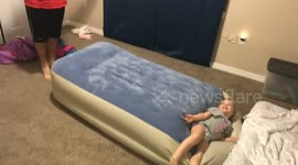 We were playing with an air mattress and our kids and we accidentally sent my daughter into the wall.