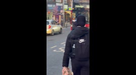 Passenger protests in front of London bus: part 1