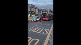 Part 2: a man stands in front of a bus in west London and refuses to move until the driver lets them on.