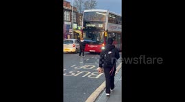 Passenger standoff halts London bus