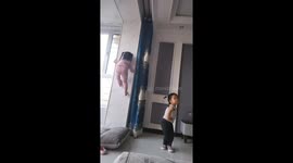 Young girl wows with Spider-Woman-esque wall climbing skills in China